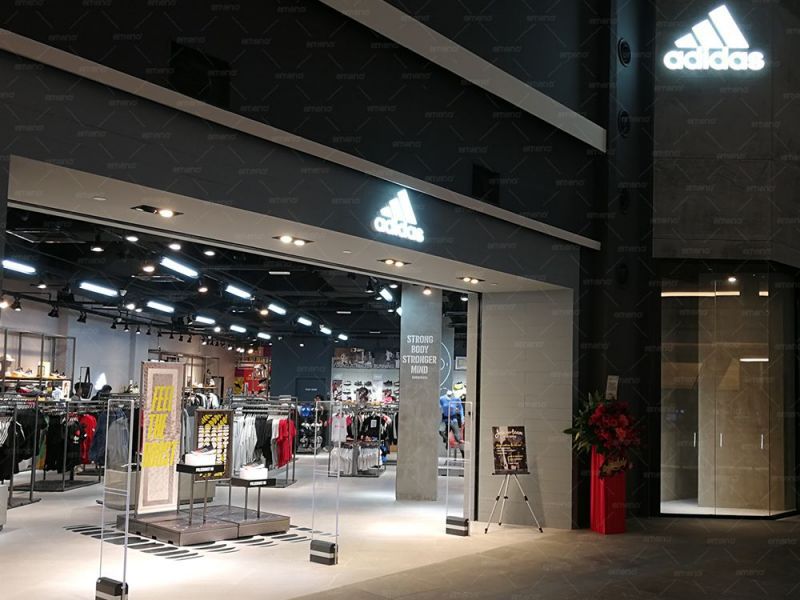 Dispozitiv antifurt de îmbrăcăminte AM9800 instalat în magazinul marca Adidas